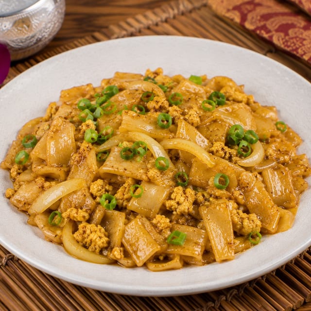 Pan Fried Flat Rice Noodles with Yellow Curry.